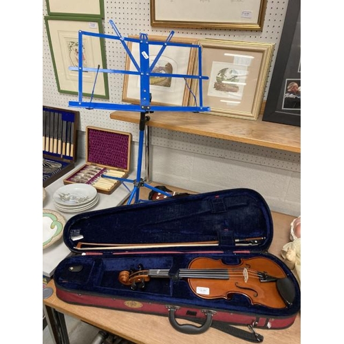 C. Giant ukulele with cover, The Stentor Student ll violin with bow and case & metal music stand