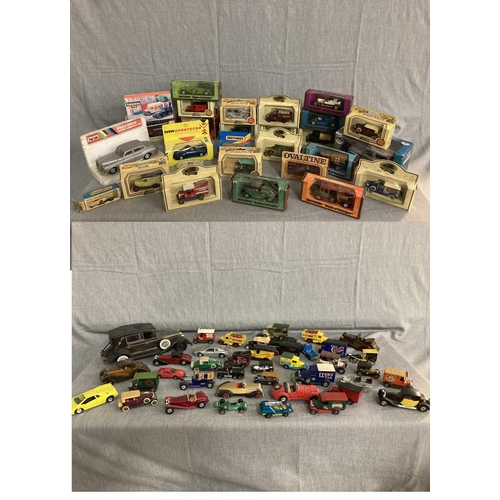 381 - Two boxes of play worn cars including boxed, Lledo, Models of Yesteryear, Matchbox, Days Gone etc.