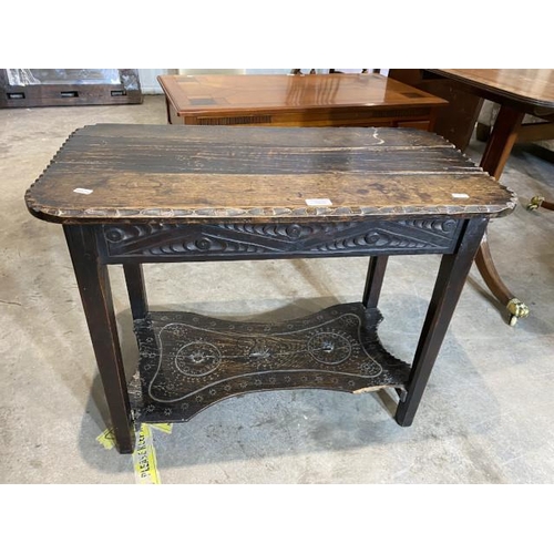 Carved oak side table (as found) (61H 77W 41D cm)