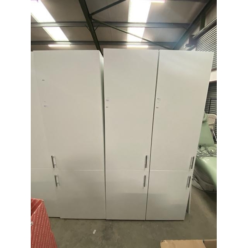 212 - Pair of white 2 door cupboards with shelves to interior (197H 50W 54D cm)