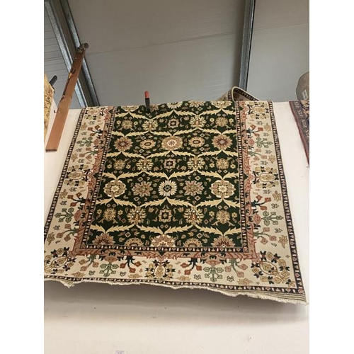 223 - Green ground Persian style rug 190cm x 123 cm