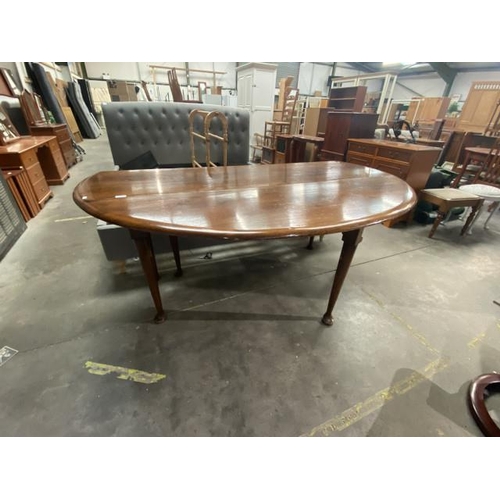 23 - Oak drop leaf dining table on pad feet (75H 150W 185D cm)