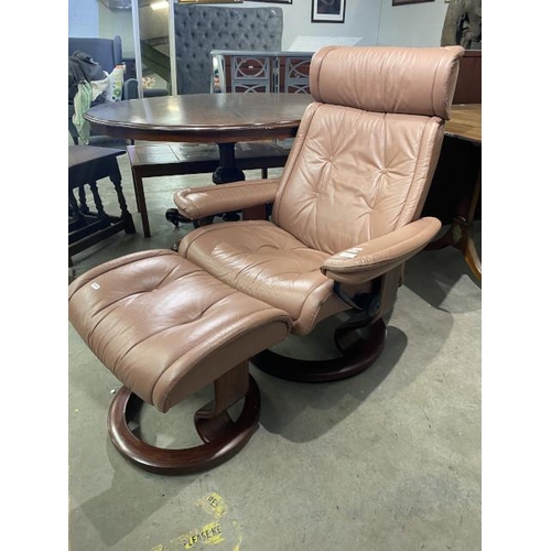 43 - Ekornes Norwegian pink leather swivel chair (75W cm) & matching footstool