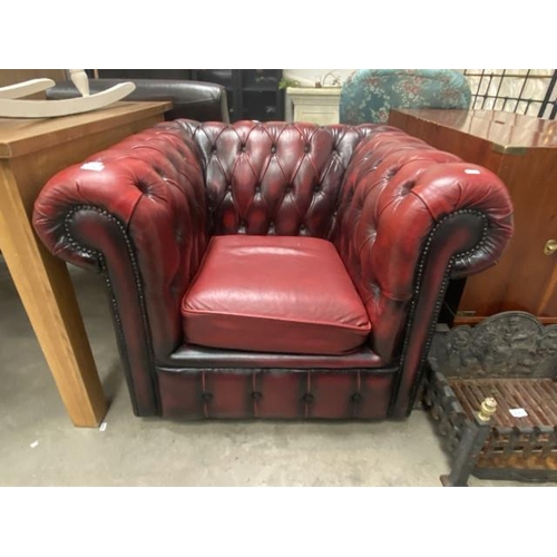 58 - Oxblood leather Chesterfield button back club chair (95W cm)