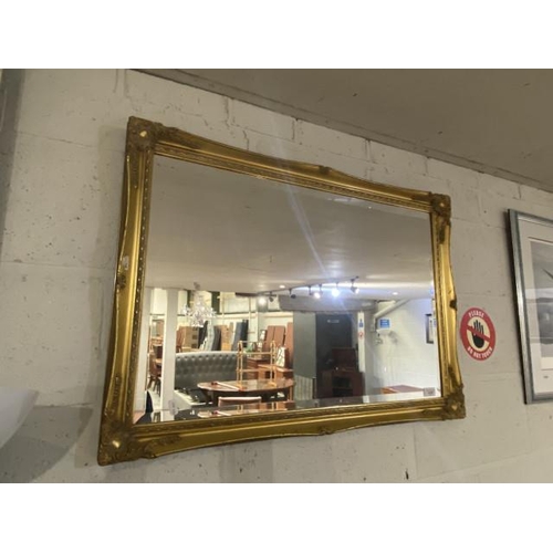 84 - Gilt framed bevel edged wall mirror (85x60cm)