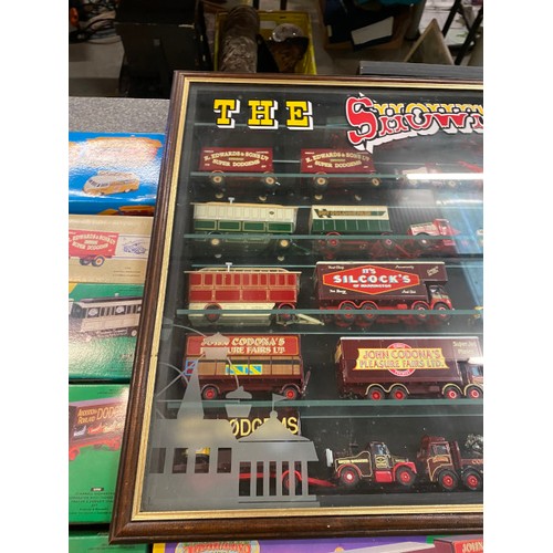 251 - 15 Corgi Showmans range inc. some original boxes & display case (display case 96W 66H 9D cm)