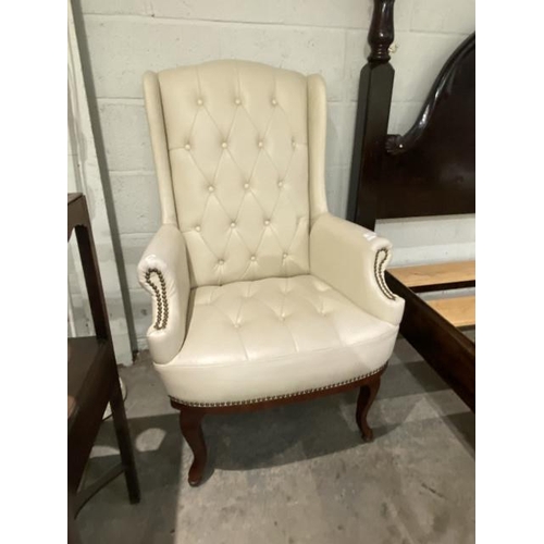 73 - Cream leather button back armchair (59W cm)