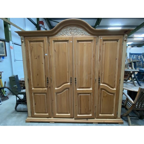 34 - Good quality pine 4 door wardrobe (227H 234W 60D cm)