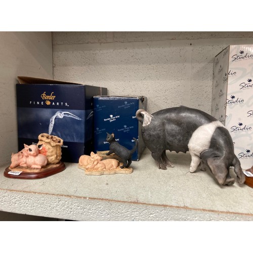 307 - 4 Boxed Border Fine Arts pig ornaments 