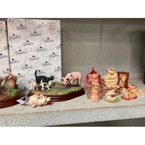 307 - 4 Boxed Border Fine Arts pig ornaments 