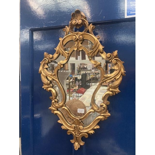 175 - Ornate gilt framed mirror 50x76cm