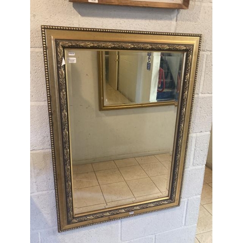 210 - Gilt framed bevel edged mirror (103x75 cm)