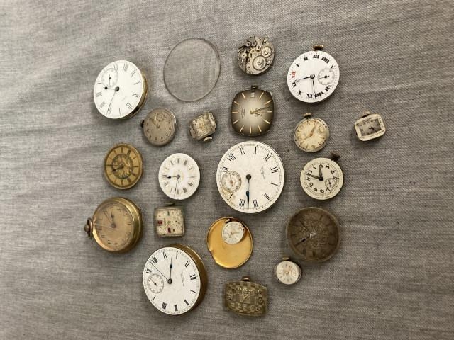 Box of watch pocket watch movements including Nivada Lucerne