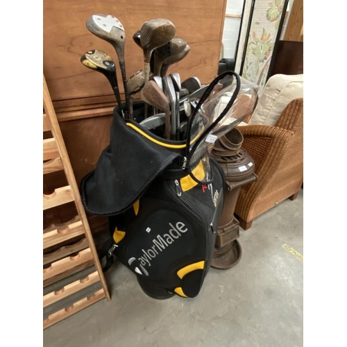 74 - Taylor Made R5 Hundred series golf bag with assorted clubs including JH Taylor, Ryder etc