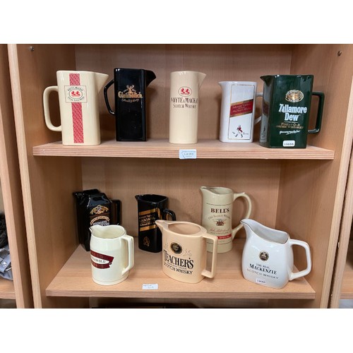 203 - 23 whisky advertising jugs including Teachers, Bell's, Johnnie Walker, Whyte & Mackay, Glenfiddich, ... 