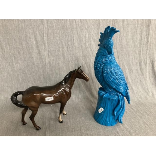 435 - Blue parrot figurine & Royal Doulton horse (slight damage to ear)