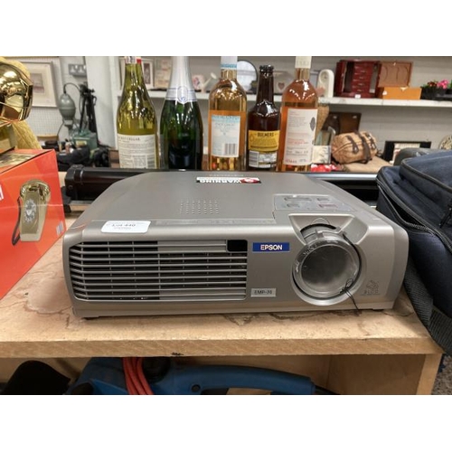 440 - Cased EPSON EMP-74 projector with power lead and a Da-Lite screen