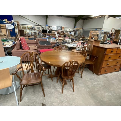 138 - Cryer Craft elm table 78H 137diam and 6 wheelback chairs inc. 2 carvers