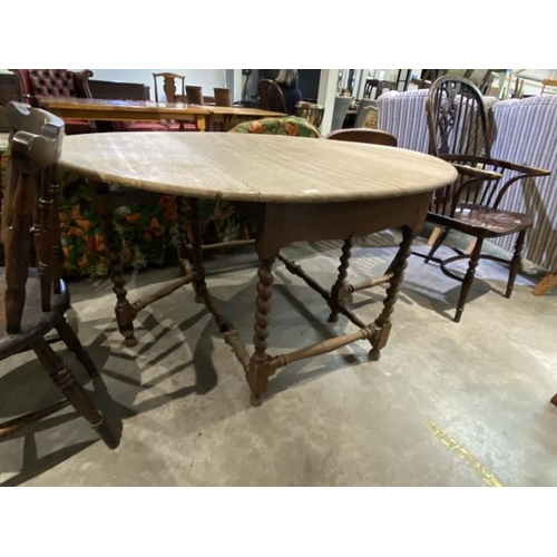 102 - Oak barley twist drop leaf table 73H 152W 113D