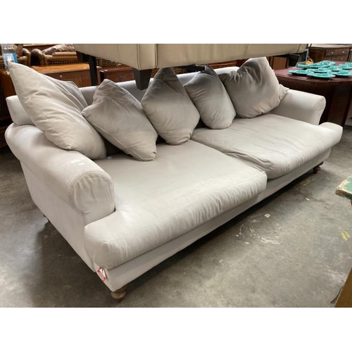 565 - Cream linen 2 seater settee 230W