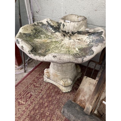 570 - Shell shaped bird bath on decorative plinth 61h x 66w x 63d cm