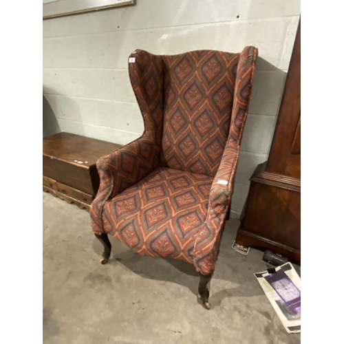 69 - Upholstered wing armchair 65W