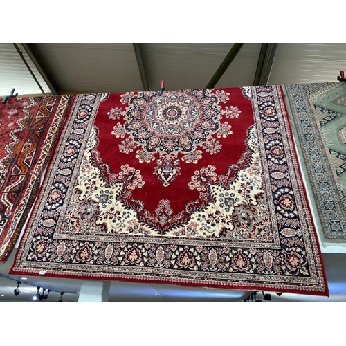 88 - Red ground Persian style rug 288 x 200cm