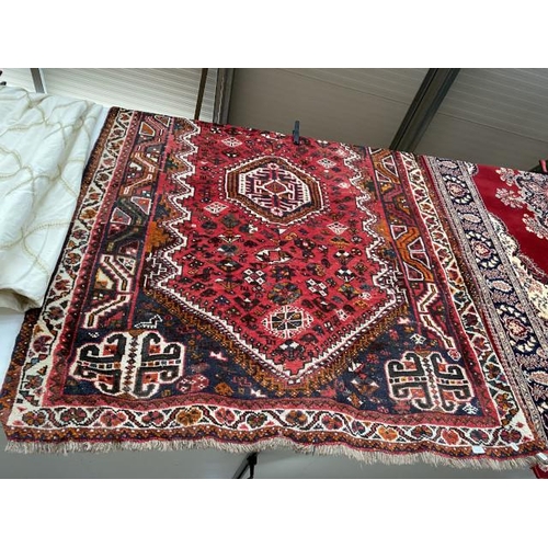 89 - Red ground Persian rug 255 x170cm