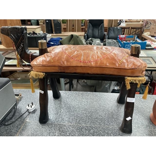 273 - Vintage camel stool with tan leather seat pad