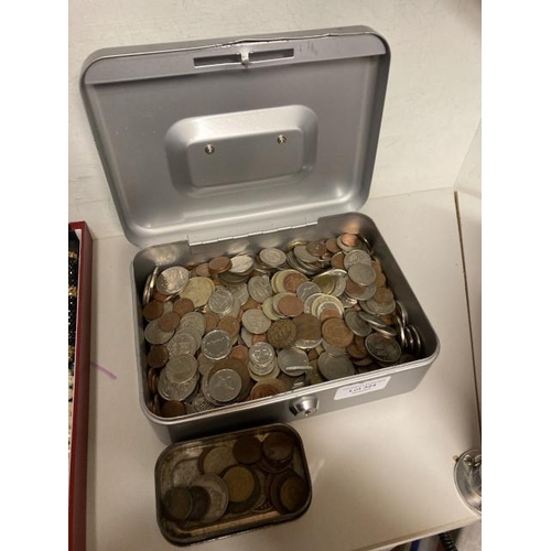 324 - Cash tin of coins Inc. George VI shillings & half penny's, foreign etc.