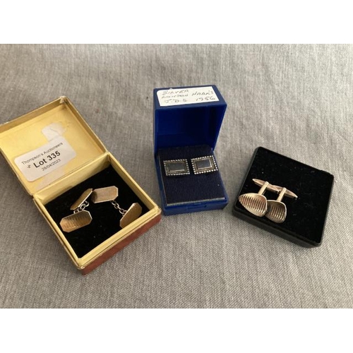 335 - 2 pairs of gold on silver cufflinks & a pair of 1956 silver cufflinks