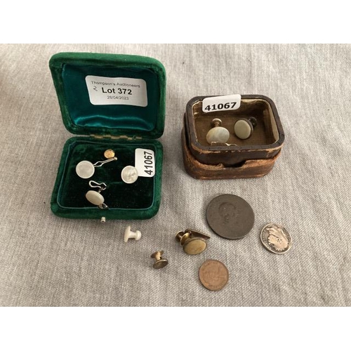 372 - Antique leather box containing shirt studs (one 9ct gold), George III 1816 silver six pence, George ... 