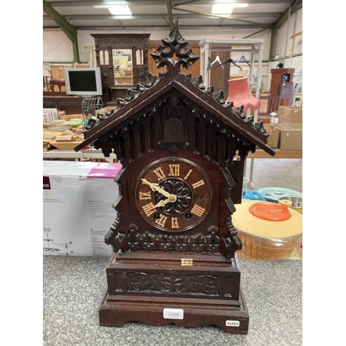 206 - A mid 19th Century Black Forest cuckoo clock with wooden movement, carved detail with pendulum (no k... 