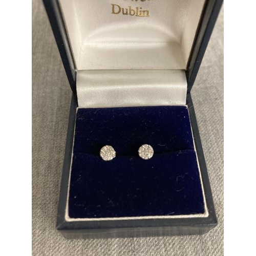 280 - 9ct (stamped 375) white gold diamond earrings. Diamond weight stamped 010 (retail price £195)