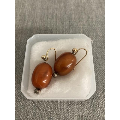 310 - Pair of drop Bakelite/ amber earrings