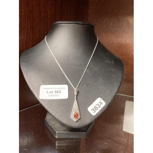 362 - Silver, amber & marcasite pendant on a silver chain