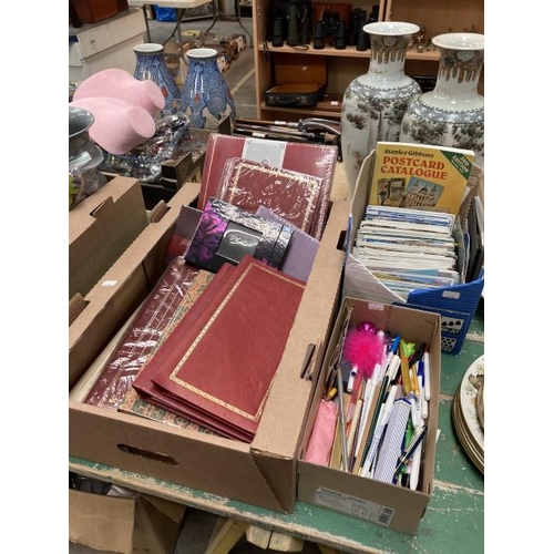 464 - Box of empty photograph albums, box of postcards & a box of advertising pens etc