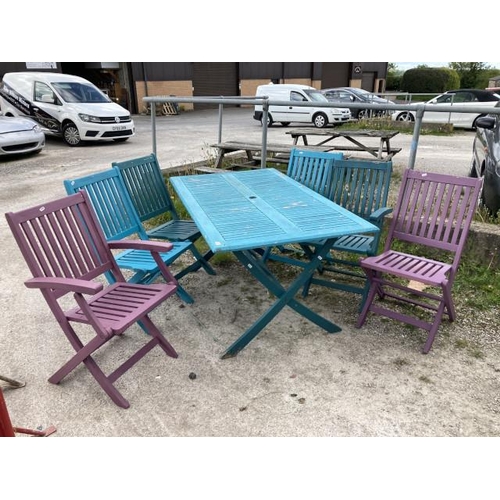 603 - Teak painted garden table 74H 150W 86D and 6 painted folding chairs