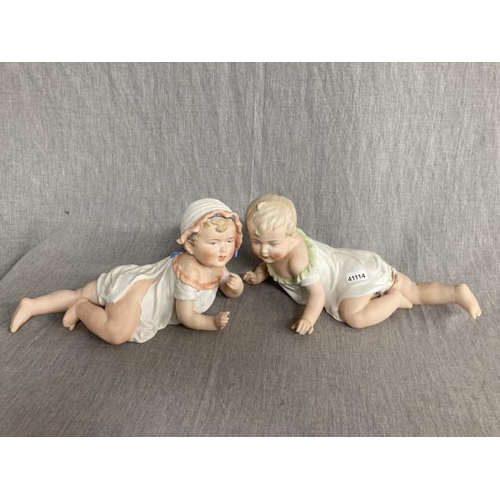 426 - 2 German (577) bisque piano babies (as seen, 29cm long each)