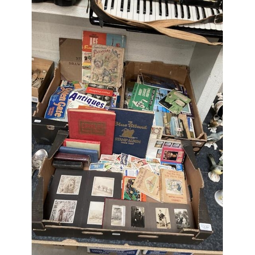 462 - 3 boxes of ephemera, photographs, tea cards, stamp albums, etc.