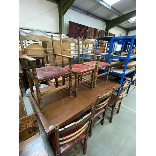 50 - Oak draw leaf table 76H 175 - 273W 91D and 6 oak & leather chairs including 2 carvers