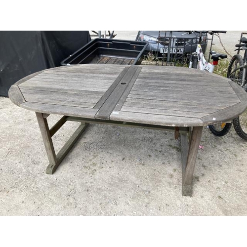 656 - Teak garden table 73H 191W 119 
D