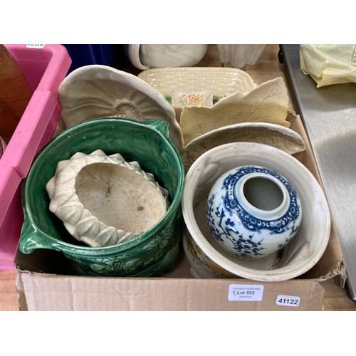 592 - Quantity of collectables inc.jelly moulds, dressing table set, plant pots, table mats, etc