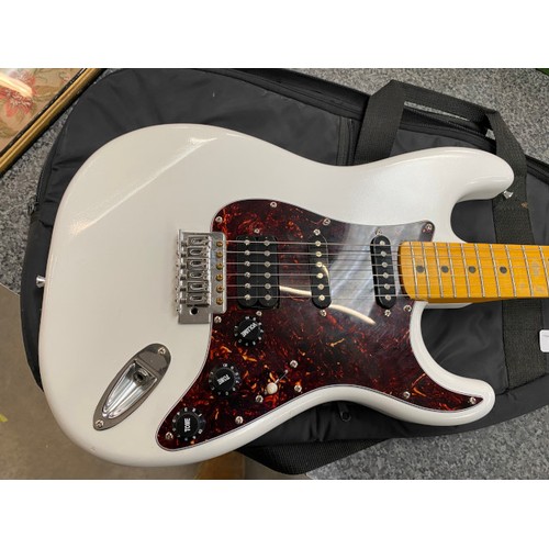 272 - Cased 3/4 Fender Stratocaster with synchronized tremolo electric guitar (serial no. WORN, could be 1... 