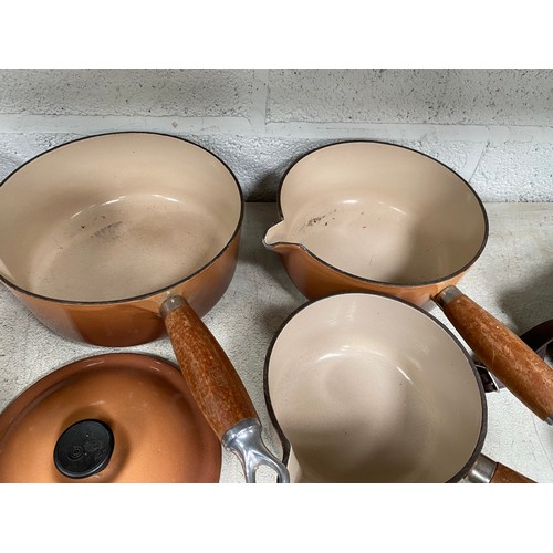 447 - 6 piece brown Le Creuset cookery set (frying pan & 5 graduated lidded pans)