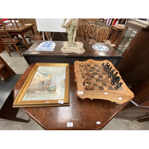 79 - Chess board and pieces 10H 53W 45D and a gilt framed oil of a harbour scene 49 x 41cm