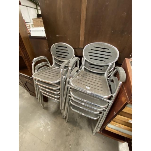 82 - 10 Andy Thornton stacking garden chairs 49W