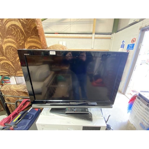 100 - Sony KDL-32W400 TV with power lead and remote