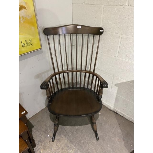 123 - Oak stick back rocking chair 60W