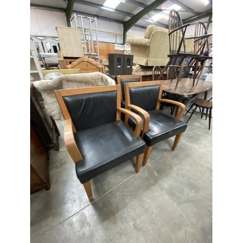 187 - 4 oak and black leather chairs ( 2 single 48W + 2 carvers 60W)